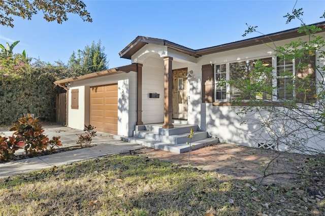 view of front of home with a garage