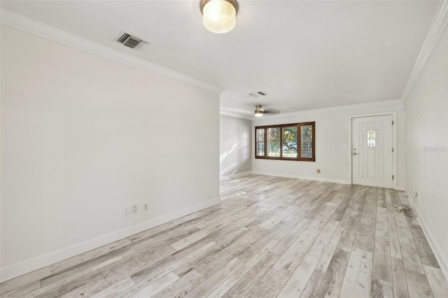 unfurnished living room with ornamental molding, light wood-type flooring, visible vents, and baseboards