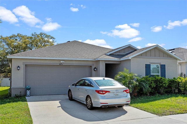 ranch-style house with a garage, driveway, a shingled roof, and board and batten siding