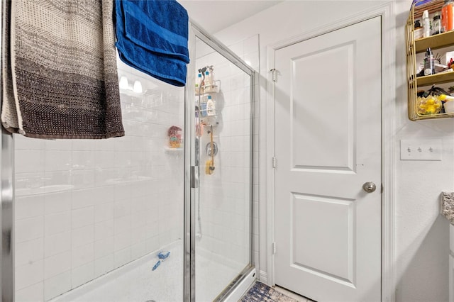 bathroom featuring a stall shower