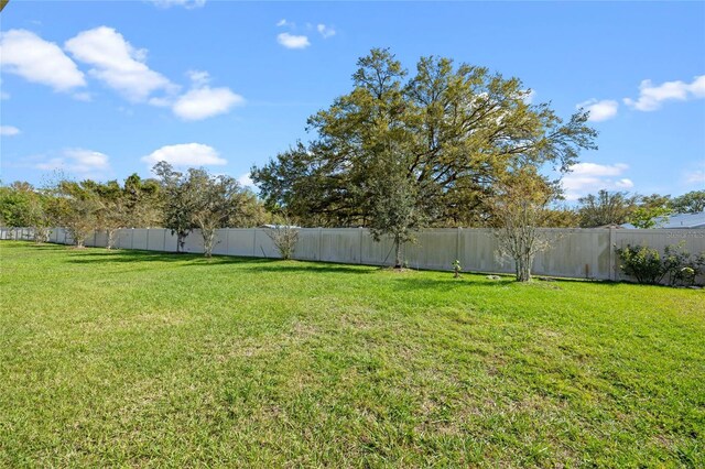 view of yard featuring fence private yard