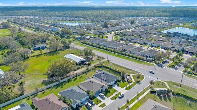 aerial view featuring a water view and a residential view