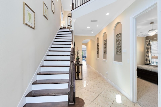 staircase with tile patterned flooring, visible vents, baseboards, recessed lighting, and a ceiling fan