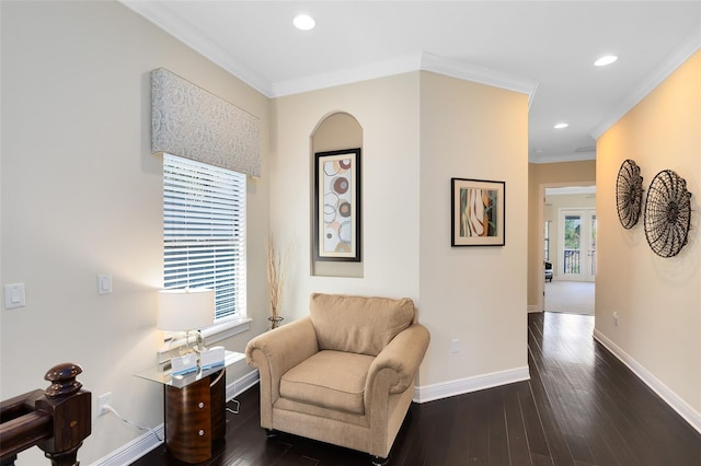 sitting room featuring crown molding, recessed lighting, baseboards, and dark wood-type flooring