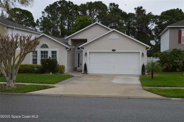 ranch-style house with a front lawn, concrete driveway, an attached garage, and stucco siding