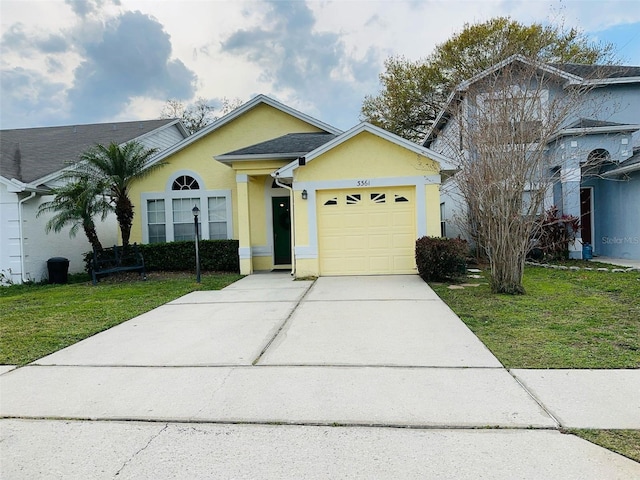 ranch-style house featuring an attached garage, a front lawn, concrete driveway, and stucco siding