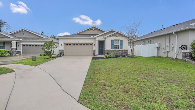 craftsman-style home with a front yard, driveway, stucco siding, a garage, and stone siding