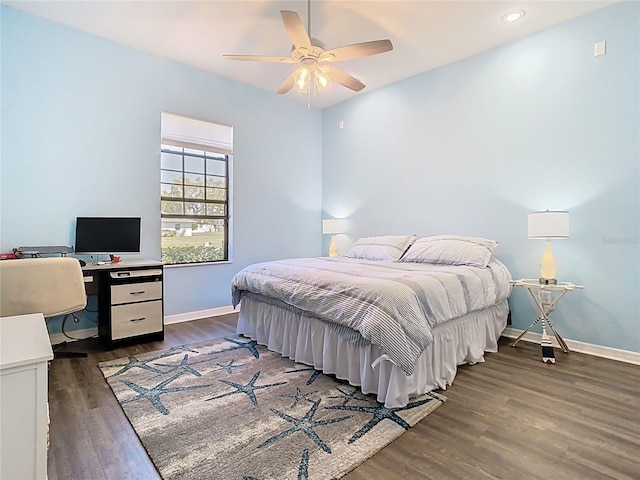 bedroom with a ceiling fan, recessed lighting, wood finished floors, and baseboards