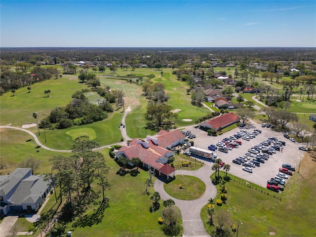 birds eye view of property with golf course view