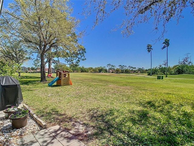 view of yard with a playground