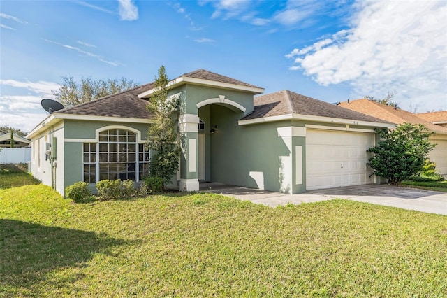 view of front facade featuring a shingled roof, concrete driveway, a front yard, stucco siding, and an attached garage