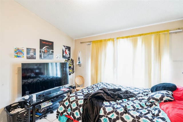 bedroom featuring lofted ceiling