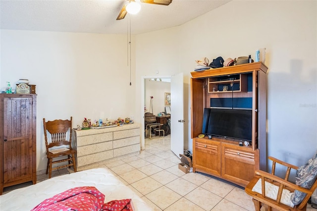 bedroom with light tile patterned floors and ceiling fan