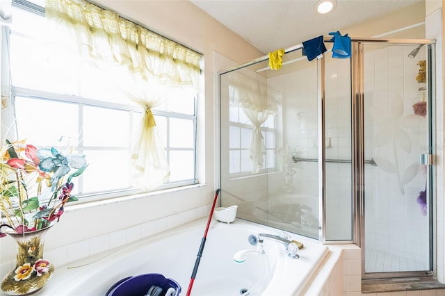 full bath featuring a bath, recessed lighting, and a stall shower