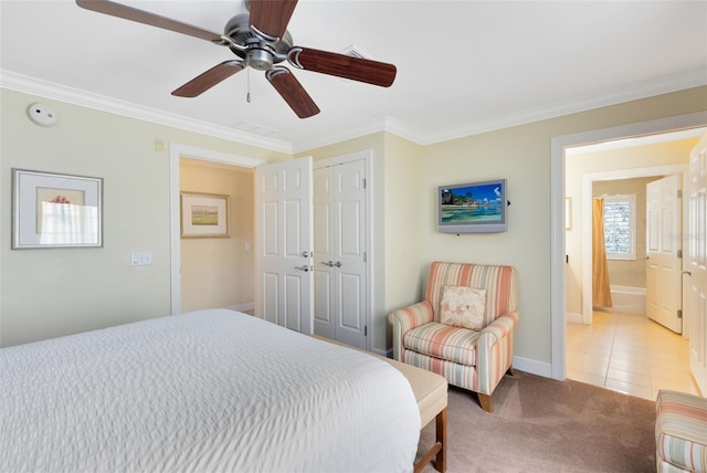 bedroom with baseboards, a closet, ornamental molding, light carpet, and light tile patterned flooring