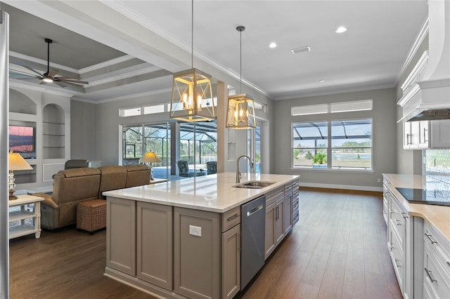 kitchen with crown molding, visible vents, gray cabinetry, stainless steel dishwasher, and a sink