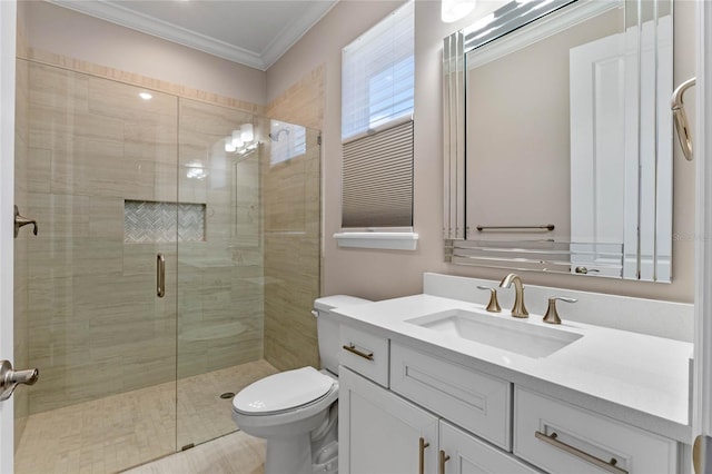 full bathroom featuring ornamental molding, a stall shower, vanity, and toilet