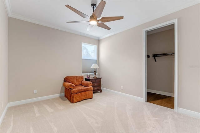 living area with baseboards, crown molding, and carpet flooring