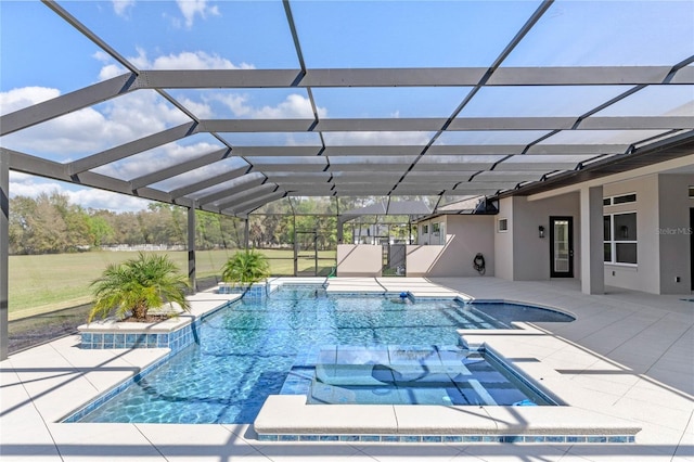 outdoor pool featuring a lanai and a patio