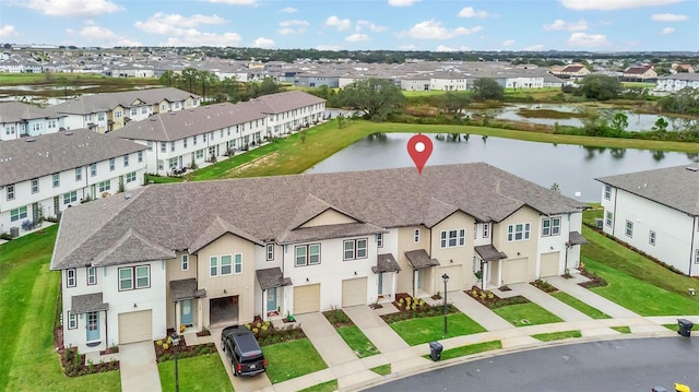 aerial view with a water view and a residential view