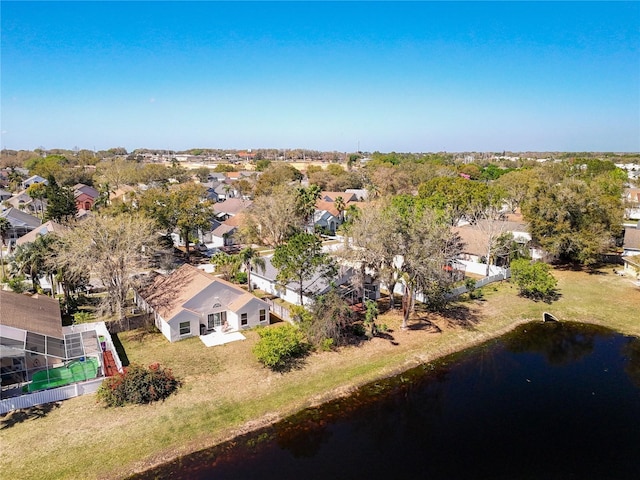 birds eye view of property featuring a residential view and a water view