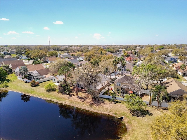 aerial view with a residential view and a water view