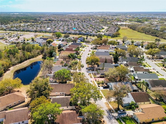 aerial view featuring a residential view and a water view