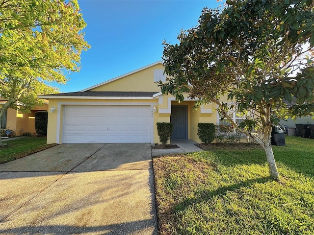 view of front of home featuring a garage, concrete driveway, a front lawn, and stucco siding