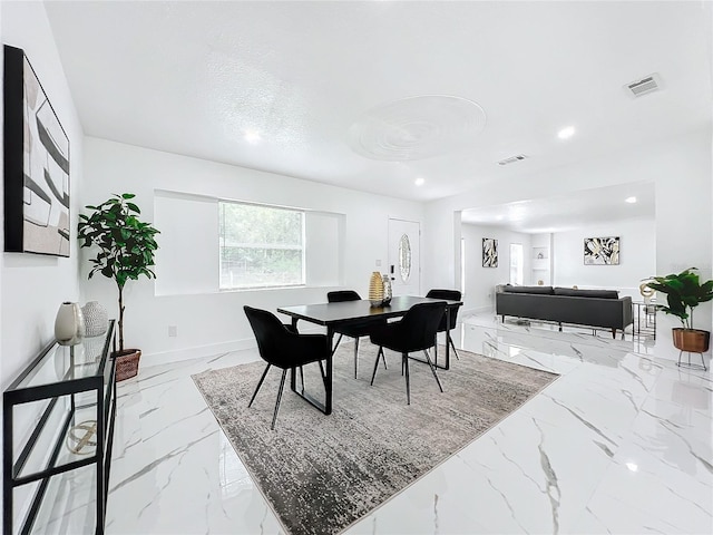 dining space with marble finish floor, baseboards, visible vents, and recessed lighting