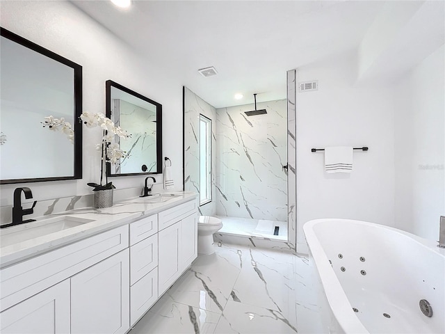 bathroom with marble finish floor, a marble finish shower, a sink, and visible vents