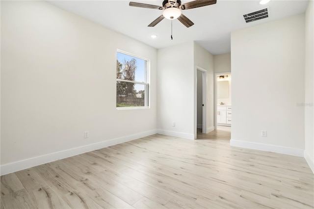 spare room with baseboards, visible vents, ceiling fan, light wood-style floors, and recessed lighting