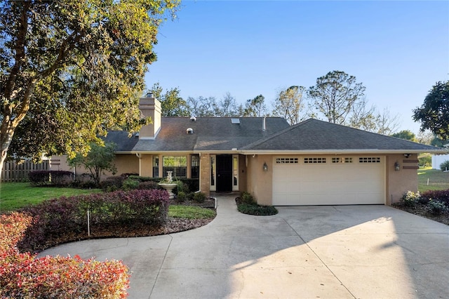 ranch-style home featuring driveway, a chimney, an attached garage, and stucco siding