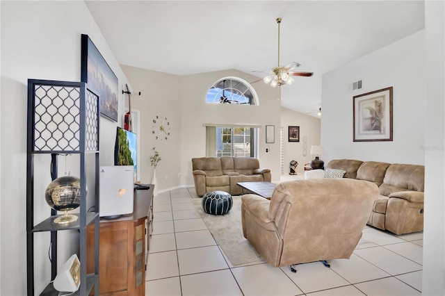 102 Ethan Ave, Davenport, FL 33897 - living room featuring vaulted ceiling, light tile patterned floors, and ceiling fan