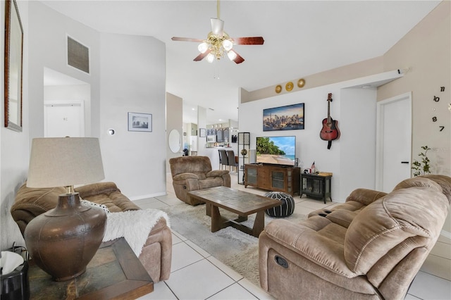 102 Ethan Ave, Davenport, FL 33897 - living area with a ceiling fan, light tile patterned flooring, and high vaulted ceiling