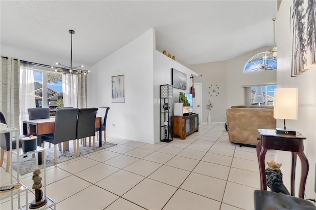 102 Ethan Ave, Davenport, FL 33897 - living room with a chandelier and light tile patterned floors