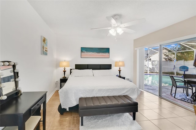 102 Ethan Ave, Davenport, FL 33897 - bedroom featuring light tile patterned floors, access to outside, a ceiling fan, and a sunroom
