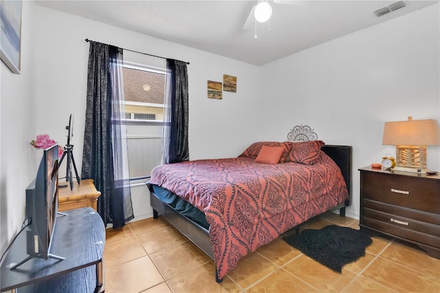 102 Ethan Ave, Davenport, FL 33897 - bedroom featuring light tile patterned floors and ceiling fan