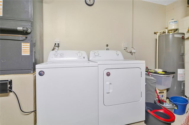 102 Ethan Ave, Davenport, FL 33897 - laundry room with washing machine and clothes dryer and water heater