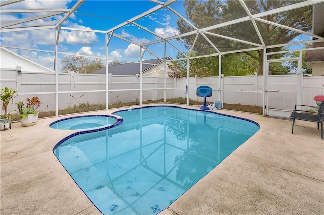 102 Ethan Ave, Davenport, FL 33897 - view of pool with a fenced backyard, a patio, a pool with connected hot tub, and glass enclosure