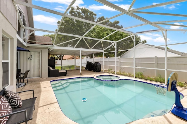 102 Ethan Ave, Davenport, FL 33897 - view of pool with a patio, a fenced backyard, glass enclosure, and a pool with connected hot tub