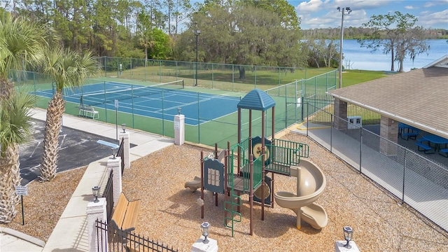 102 Ethan Ave, Davenport, FL 33897 - view of tennis court with a water view