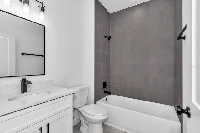bathroom with vanity, toilet, and shower / washtub combination