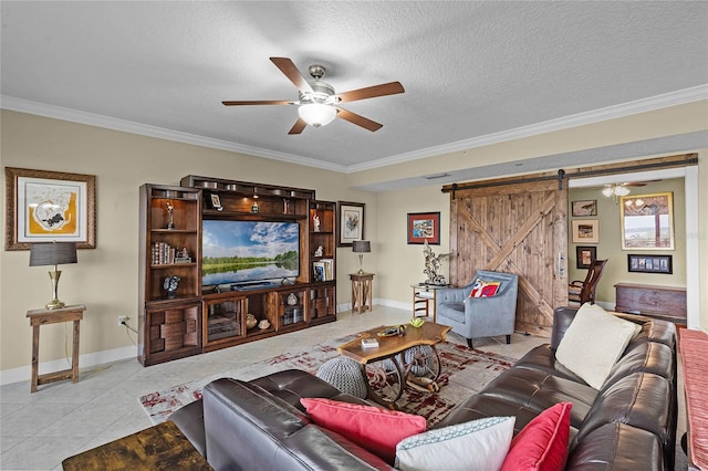 tiled living room featuring a ceiling fan, ornamental molding, and a textured ceiling