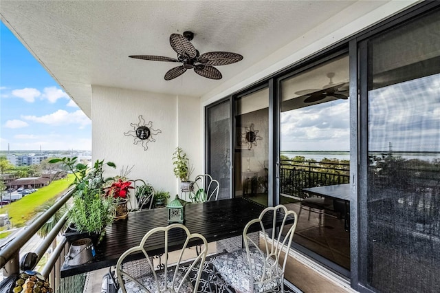 balcony featuring a ceiling fan