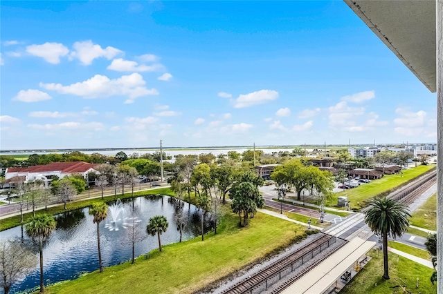 drone / aerial view featuring a water view