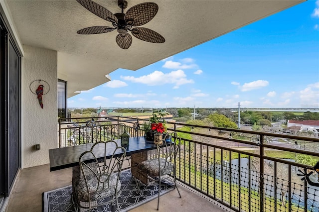 balcony featuring a ceiling fan