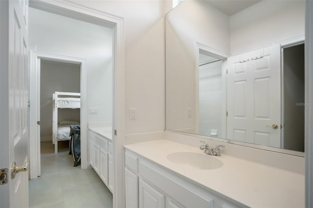 bathroom featuring vanity and tile patterned flooring