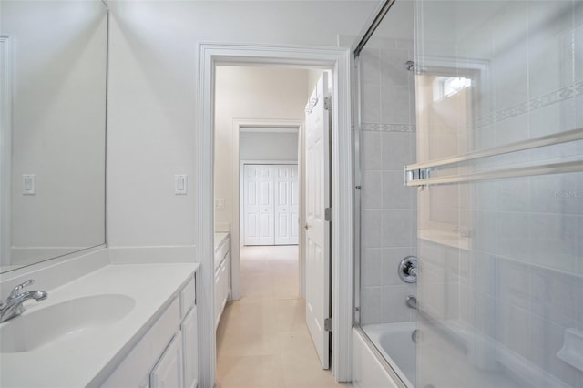 full bath featuring vanity and shower / bathtub combination