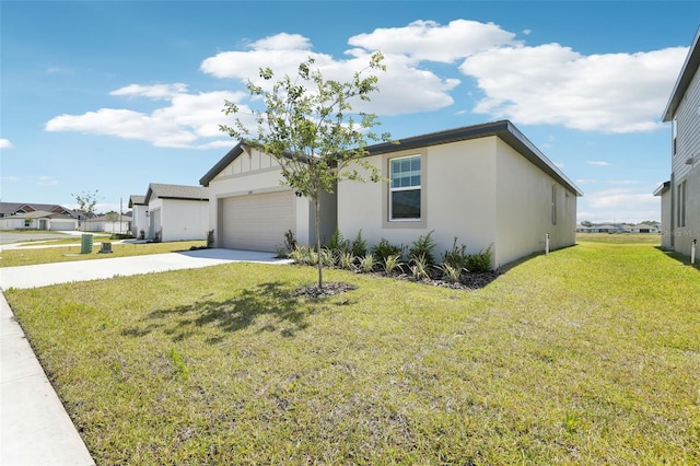 ranch-style house with concrete driveway, an attached garage, a front lawn, and stucco siding