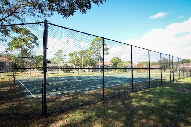 view of sport court with community basketball court and fence